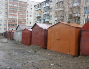 Власти Петербурга одобрили закон о выплатах компенсаций владельцам снесенных гаражей